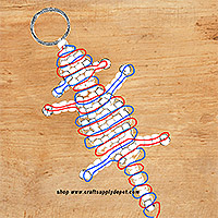 Cord threading pattern for beaded cow keychain.
